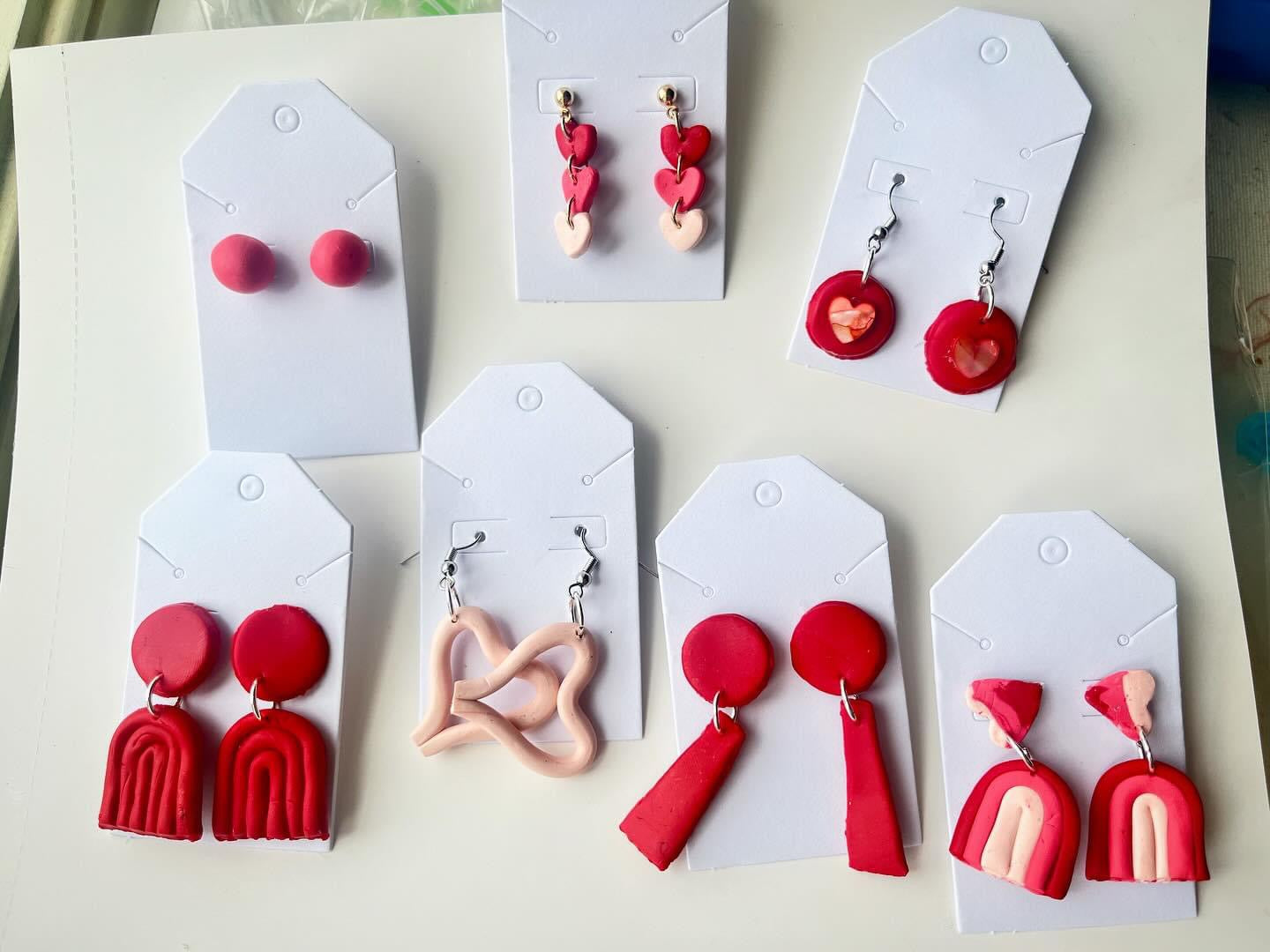 Falling Hearts Dangling Earrings